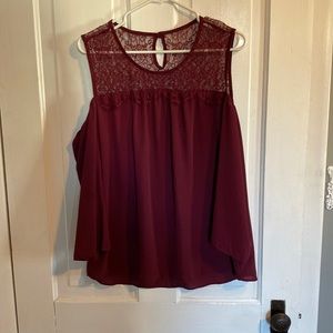 Lace detail top with bell 3/4 sleeves. Polyester and nylon.